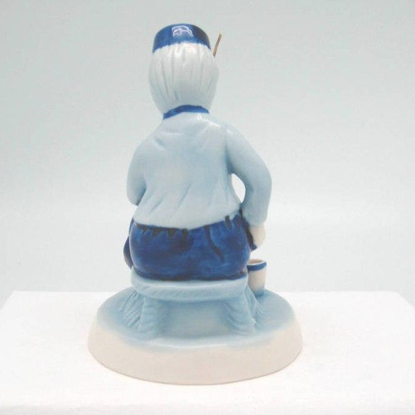 Delft Blue and White Figurine: Dutch Boy Fishing