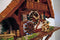 River City Clocks One Day Musical 17" German Cuckoo Clock Man Saws Wood - GermanGiftOutlet.com
 - 2